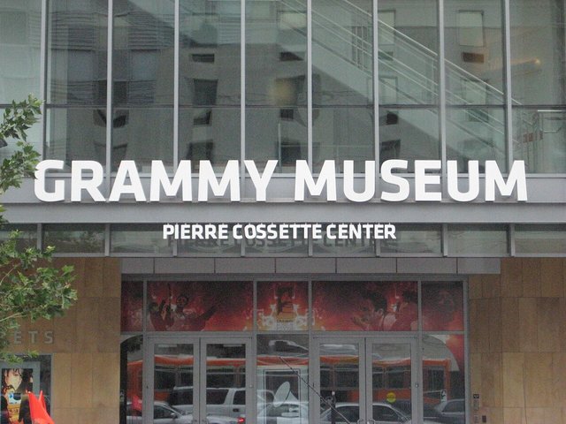 White Grammy Museum lettering above the glass entrance at L.A. Live