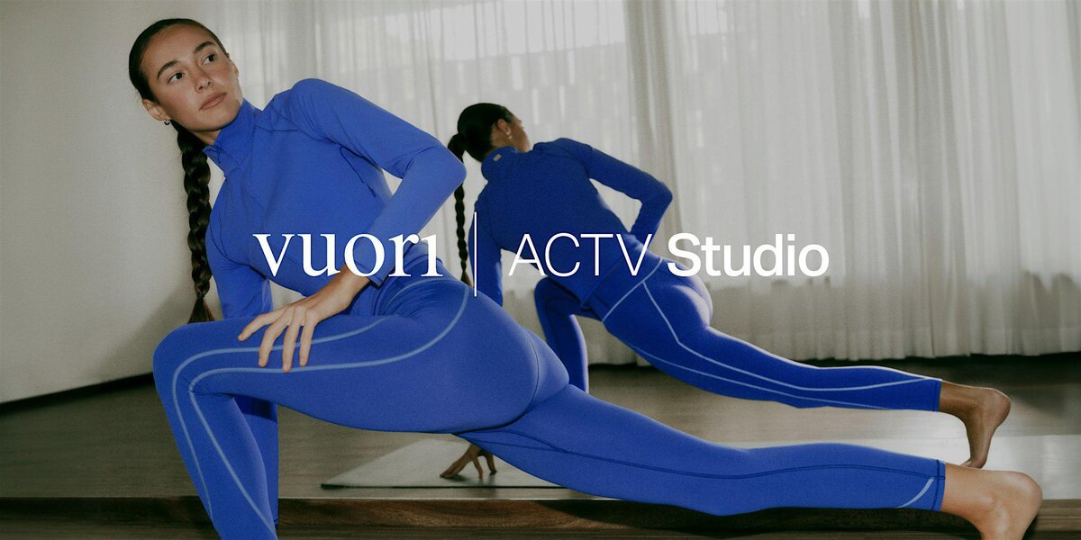 Woman in blue Vuori activewear in a low lunge on a studio floor, with the Vuori ACTV Studio logo across the image