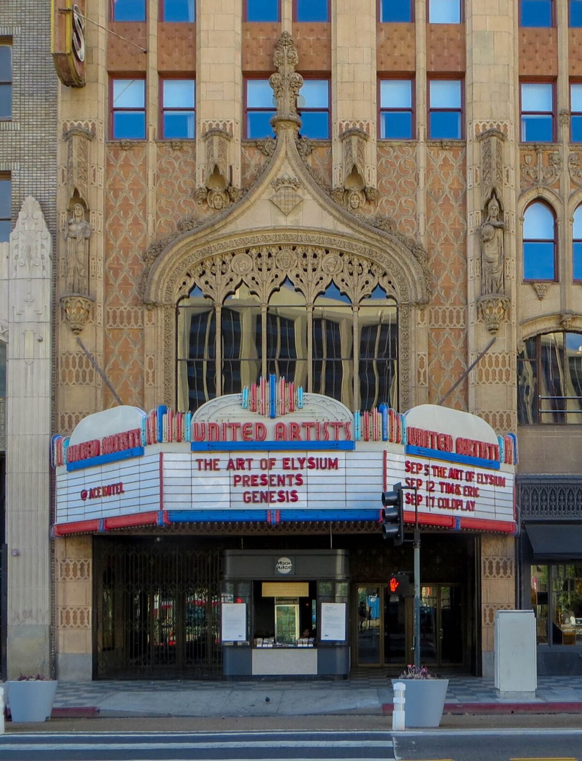 Gothic tiled facade and marquee of The United Theater on Broadway in downtown Los Angeles