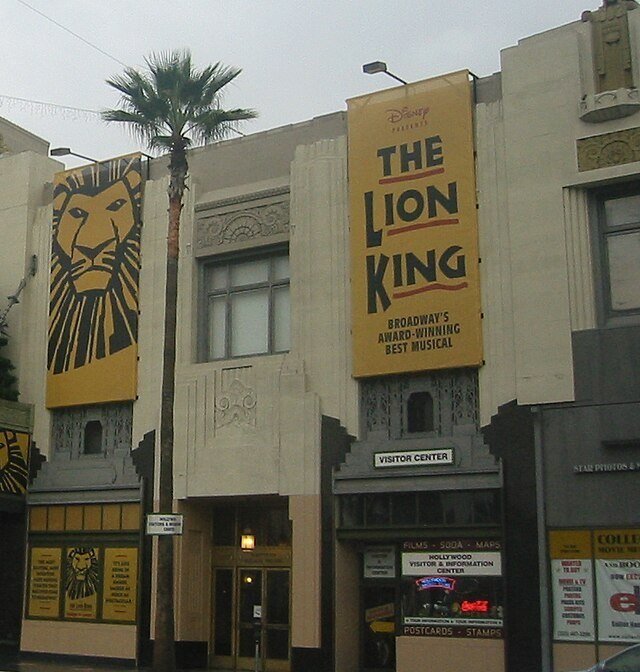 Hollywood Pantages Theatre facade hung with The Lion King banners above the entrance