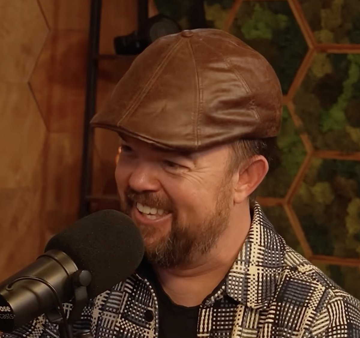 Brad Williams, stand-up comedian, laughing during a performance