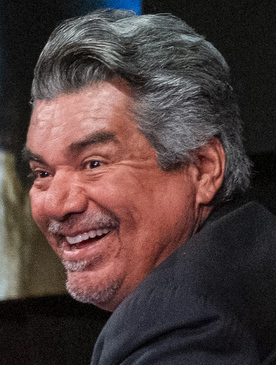 George Lopez smiling at a 2019 public event