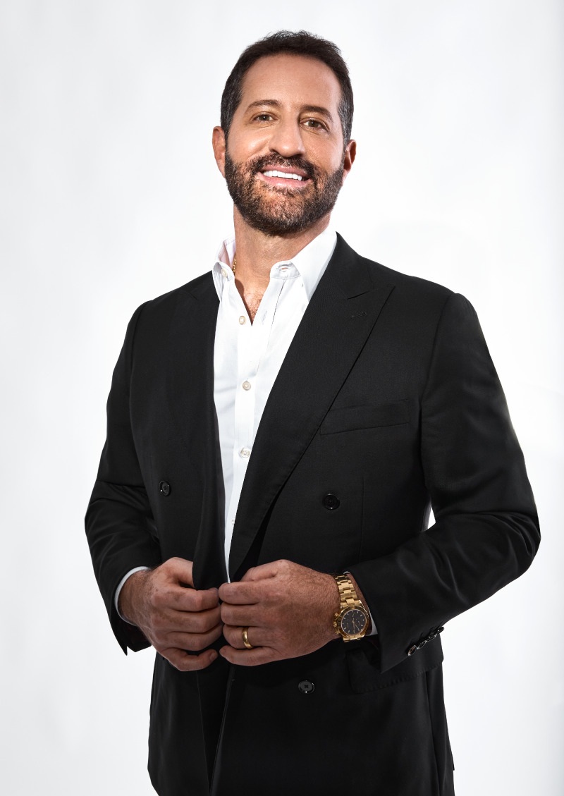 Comedian Modi Rosenfeld performing on stage
