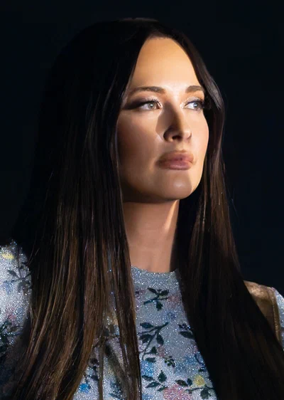 Photo of Kacey Musgraves performing on stage