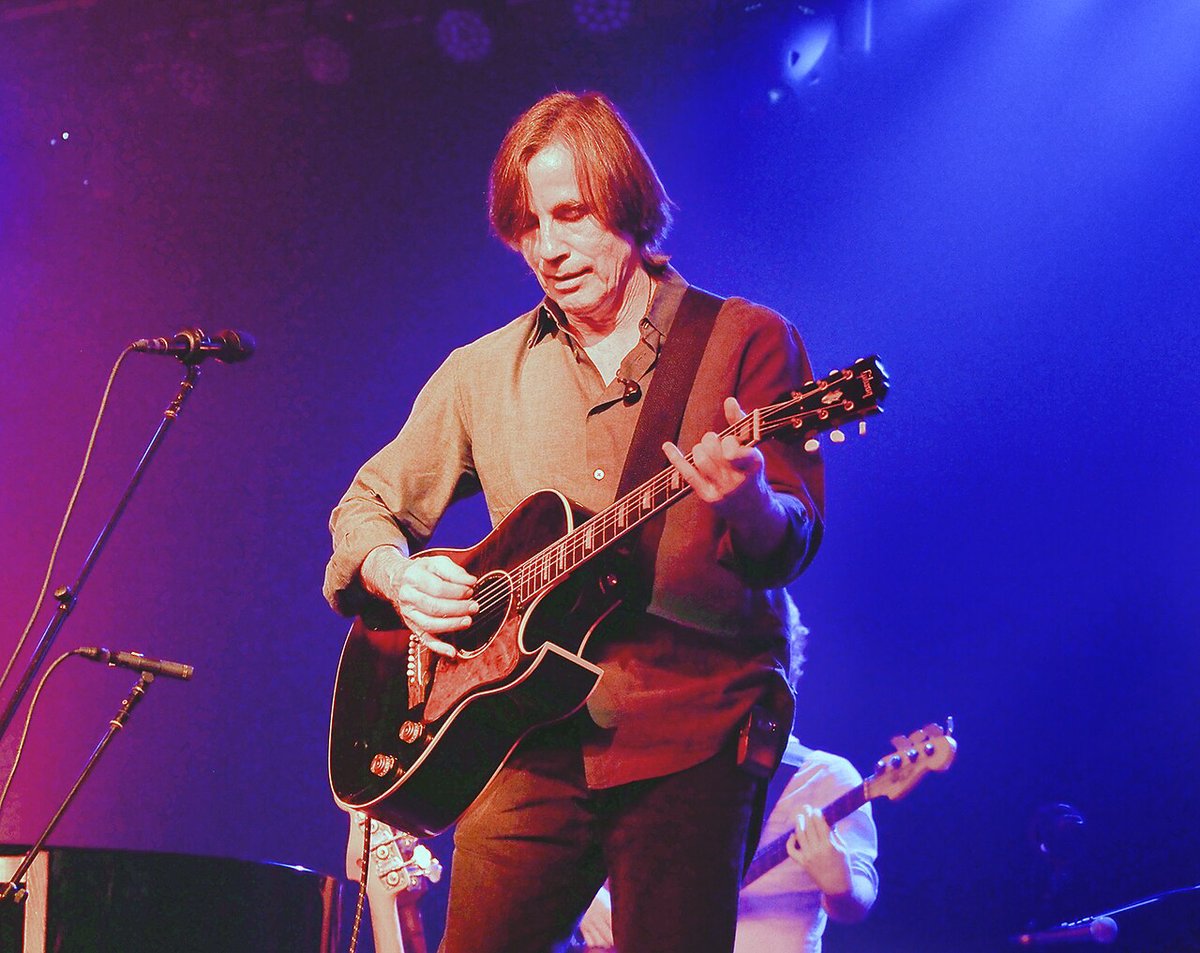 Jackson Browne performing on stage at a casino resort venue