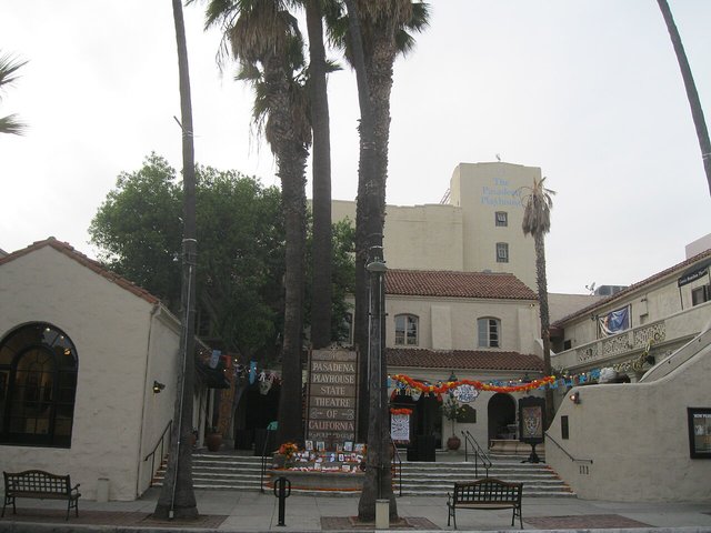 Palm trees and the Spanish Colonial courtyard of the Pasadena Playhouse, the namesake of Pasadena's Playhouse Village