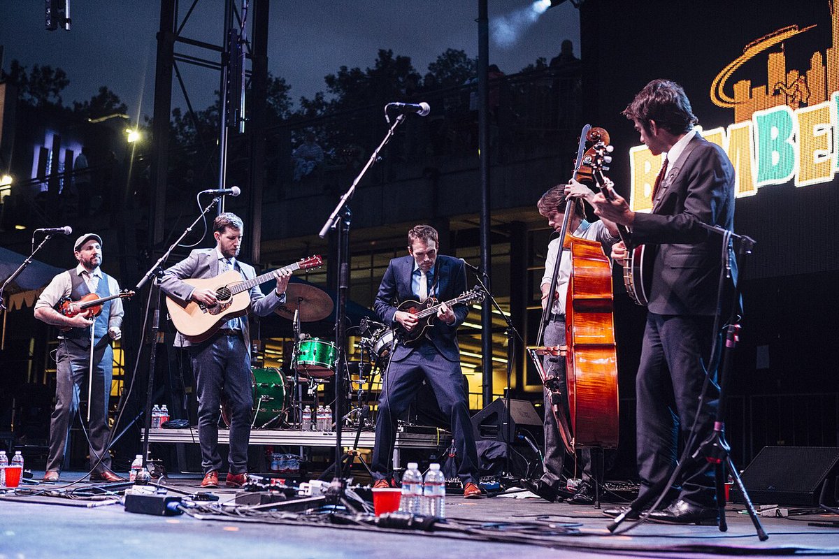 Punch Brothers performing on an outdoor stage at Bumbershoot 2015