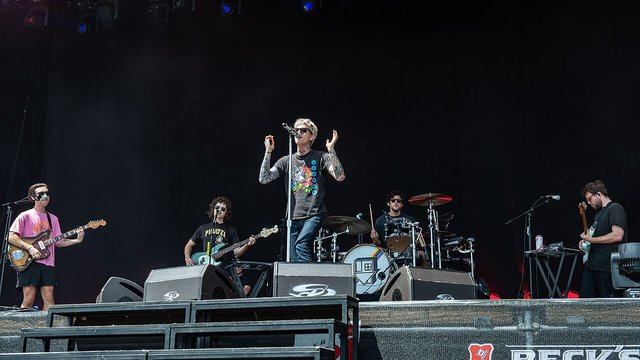 The Neighbourhood performing live on stage at a festival concert