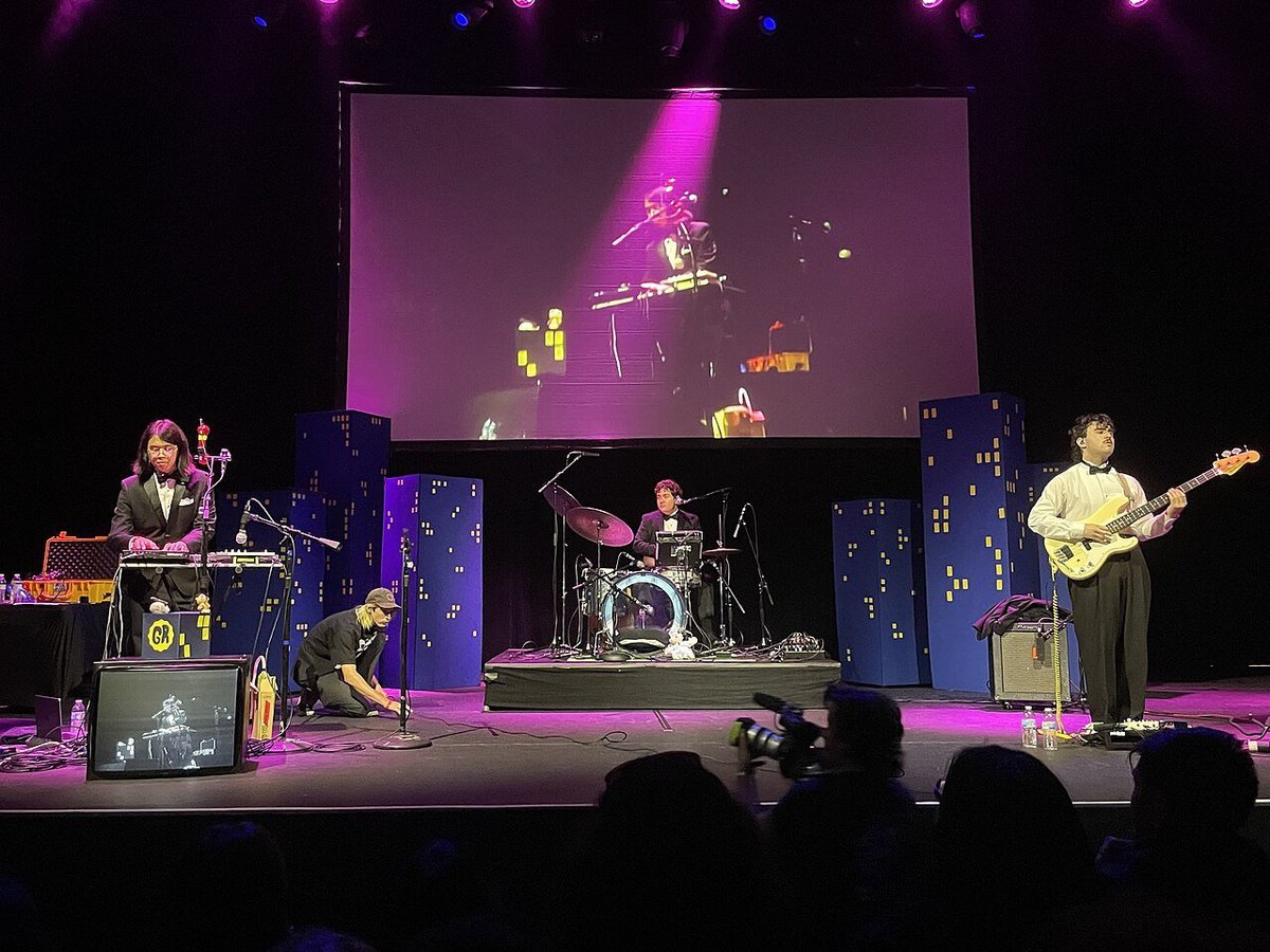 The Novo interior during a performance, showing the venue's mid-size stage and audience floor in downtown Los Angeles