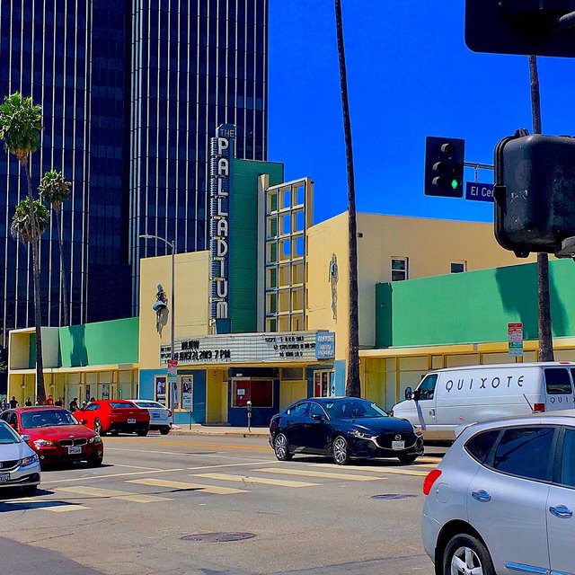 Street view of the Hollywood Palladium building and its vertical sign on Sunset Boulevard