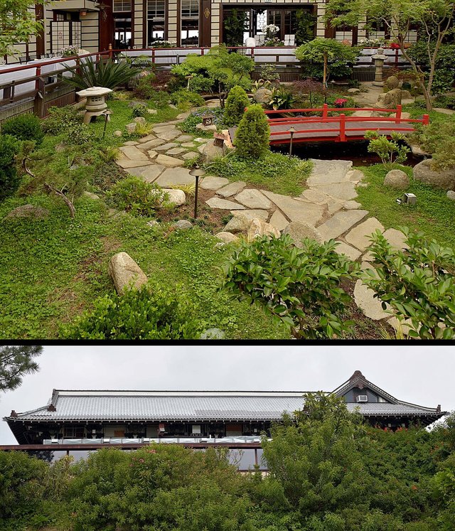 Japanese garden with a red footbridge and stone path in front of the Yamashiro building