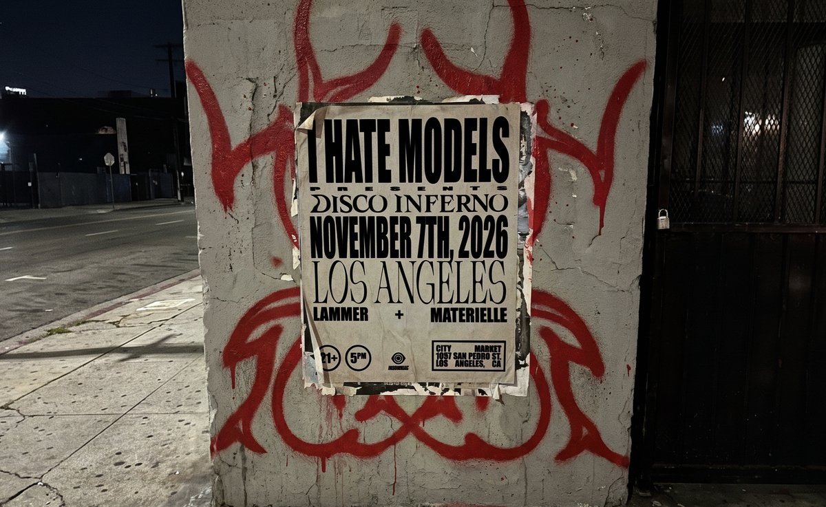 I Hate Models Disco Inferno flyer pasted on a concrete wall with red painted designs, reading November 7th, 2026, Los Angeles, Lammer and Materielle