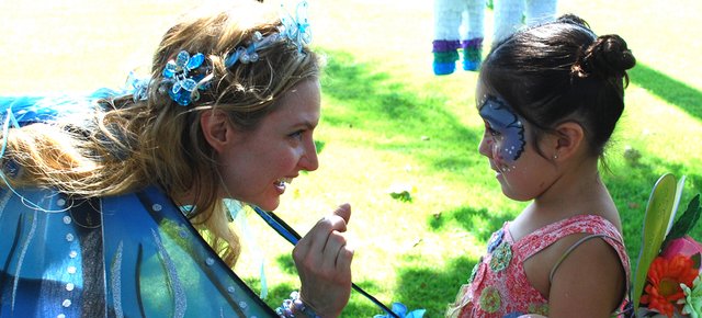 Promotional photo for A Faery Hunt, an interactive outdoor family show with costumed faeries