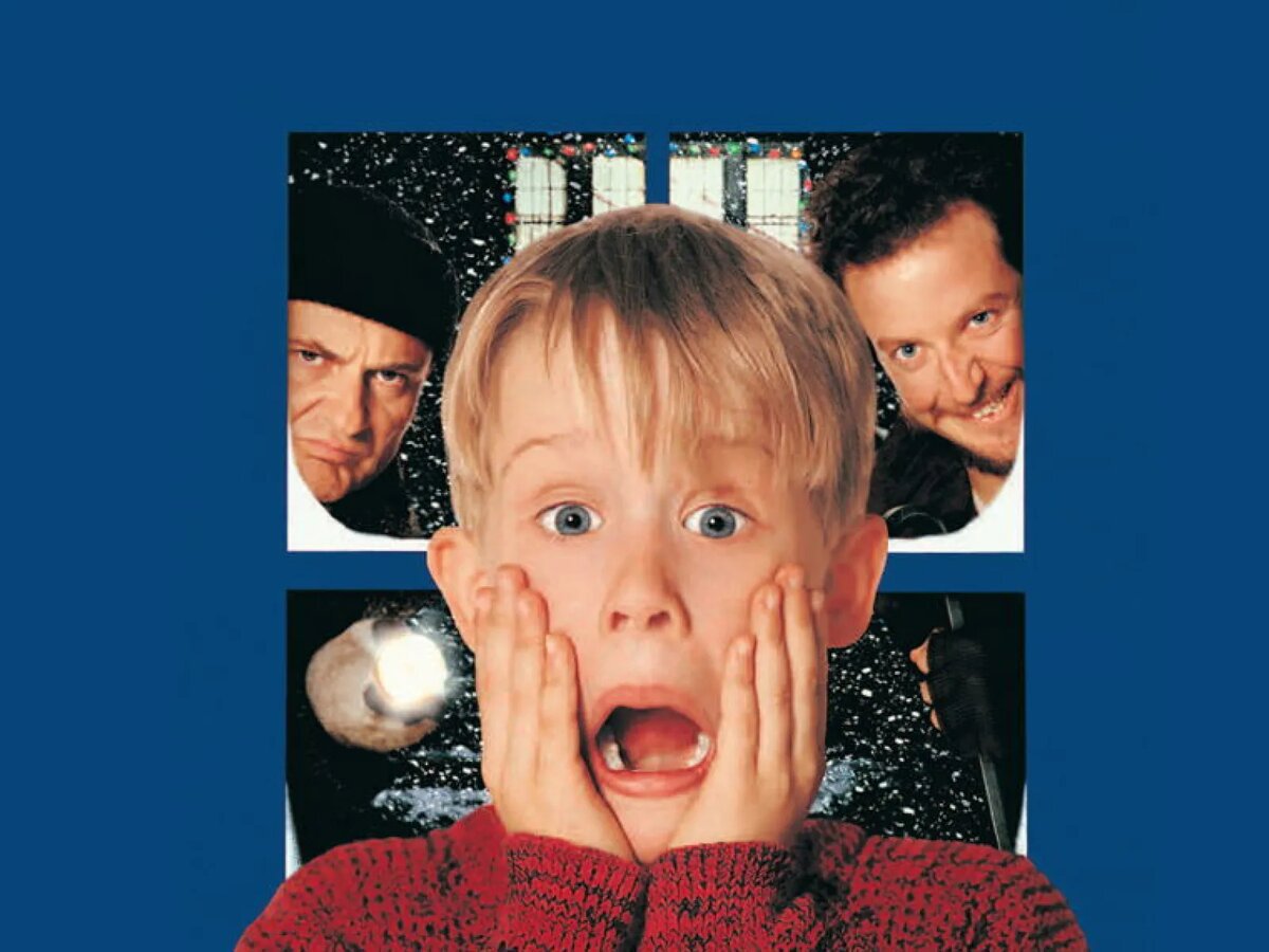 Home Alone key art showing a boy in a red sweater with his hands on his cheeks in front of a snowy window