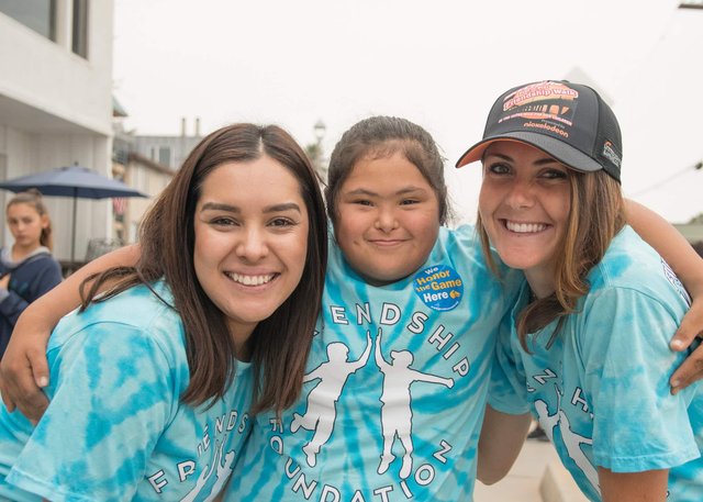 Walkers and families gathered for the Skechers Pier to Pier Friendship Walk along the South Bay coast
