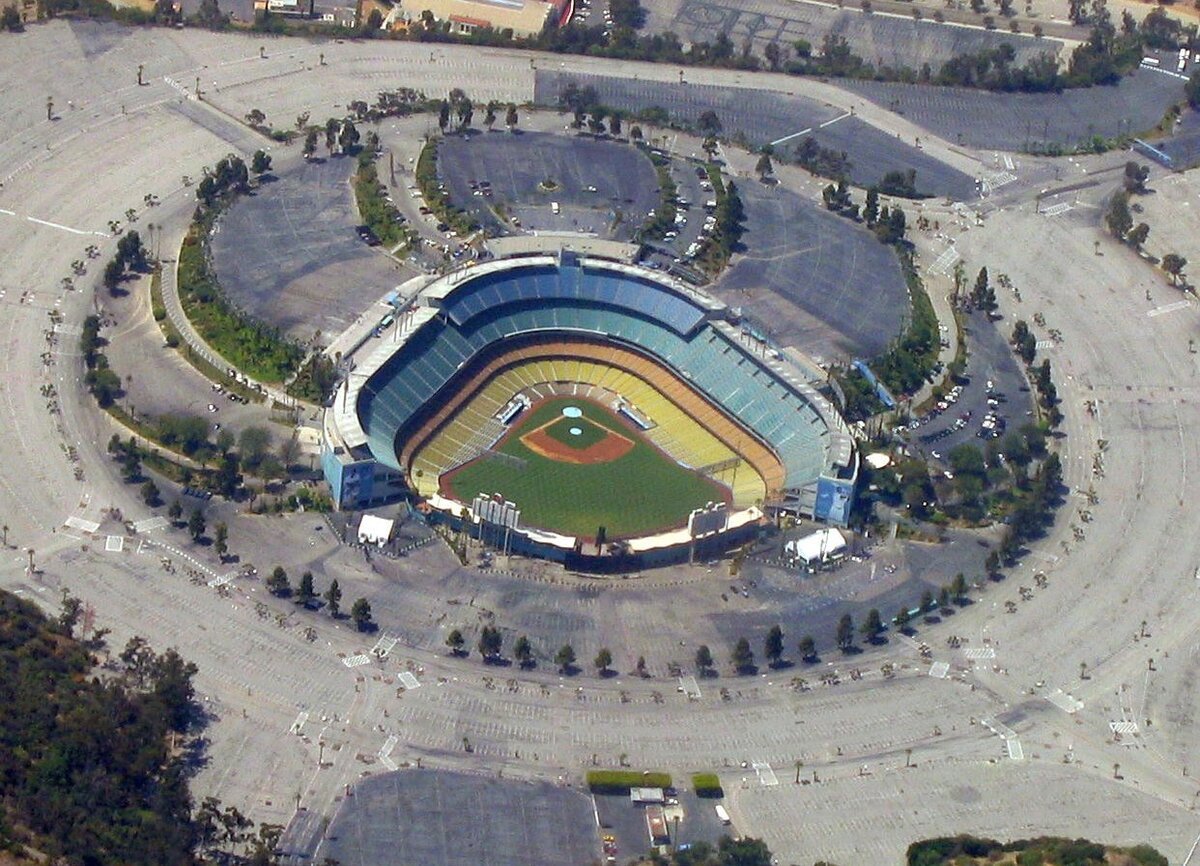Aerial view of Dodger Stadium surrounded by its large parking lots
