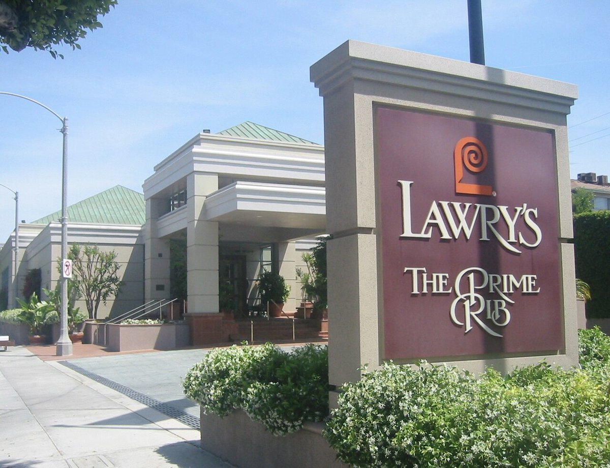Lawry’s The Prime Rib sign outside the restaurant's entrance on La Cienega Boulevard in Beverly Hills