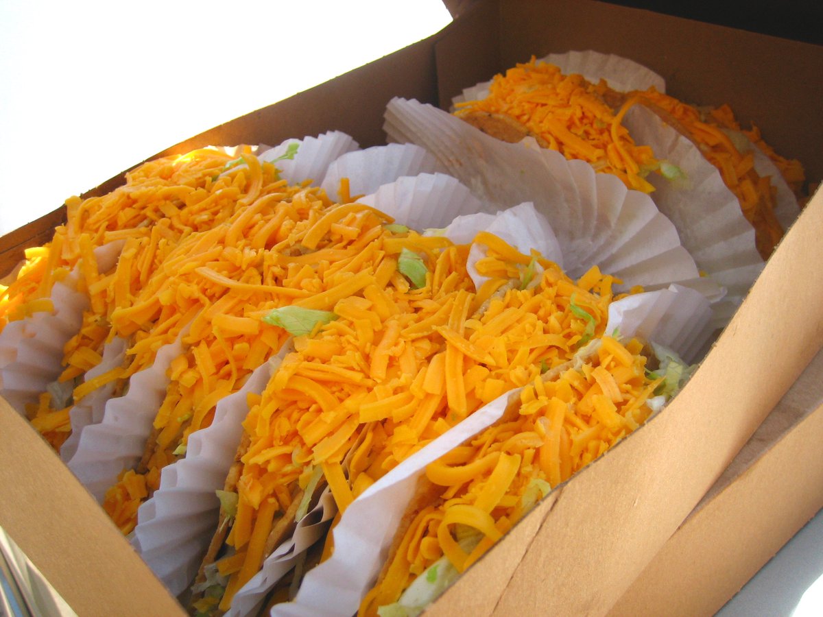 Tito's Tacos hard-shell tacos topped with shredded beef, lettuce and cheese