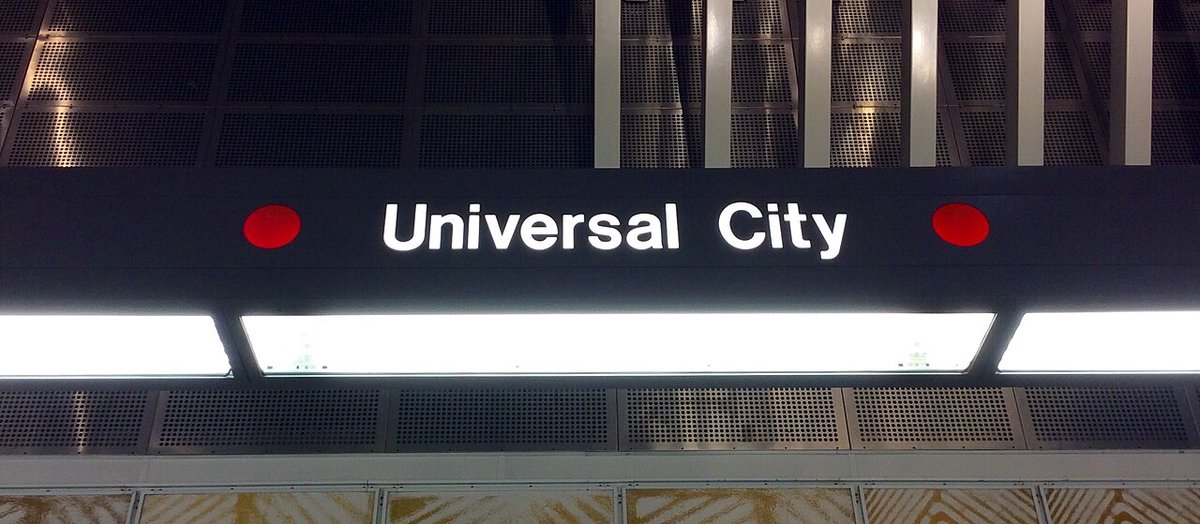 Illuminated Universal City sign above the platform at the Universal City Metro station