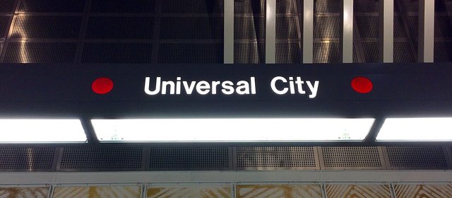 Illuminated Universal City sign above the platform at the Universal City Metro station