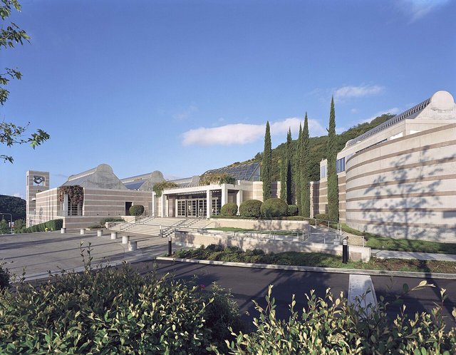 Skirball Cultural Center building exterior with warm stone architecture and clear Los Angeles sky