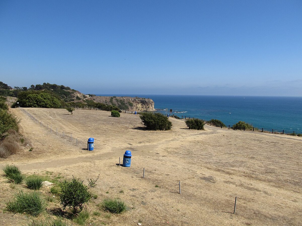 Rolling, tree-covered hills of the Palos Verdes Peninsula overlooking the coastline