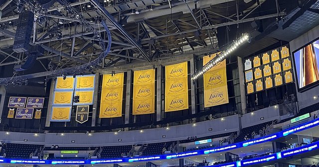 Lakers championship banners and retired jersey numbers hanging from the rafters at Crypto.com Arena