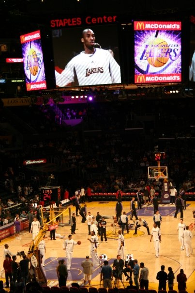 Los Angeles Lakers players warming up on the court at Crypto.com Arena before tip-off