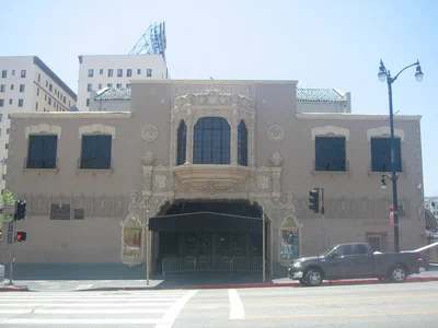 The ornate Spanish-style front and black awning of the Avalon Hollywood building on Vine Street