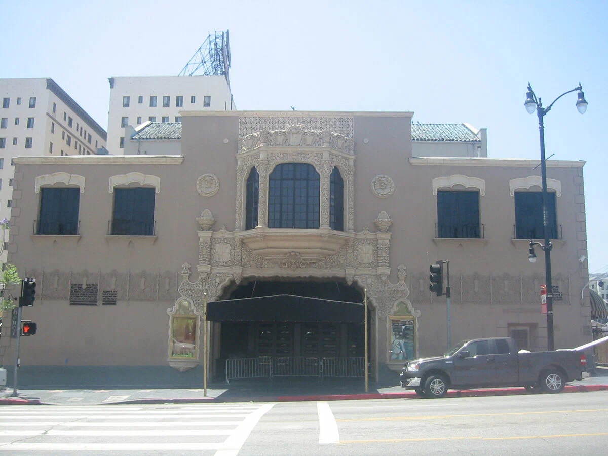 The ornate Spanish-style front and black awning of the Avalon Hollywood building on Vine Street